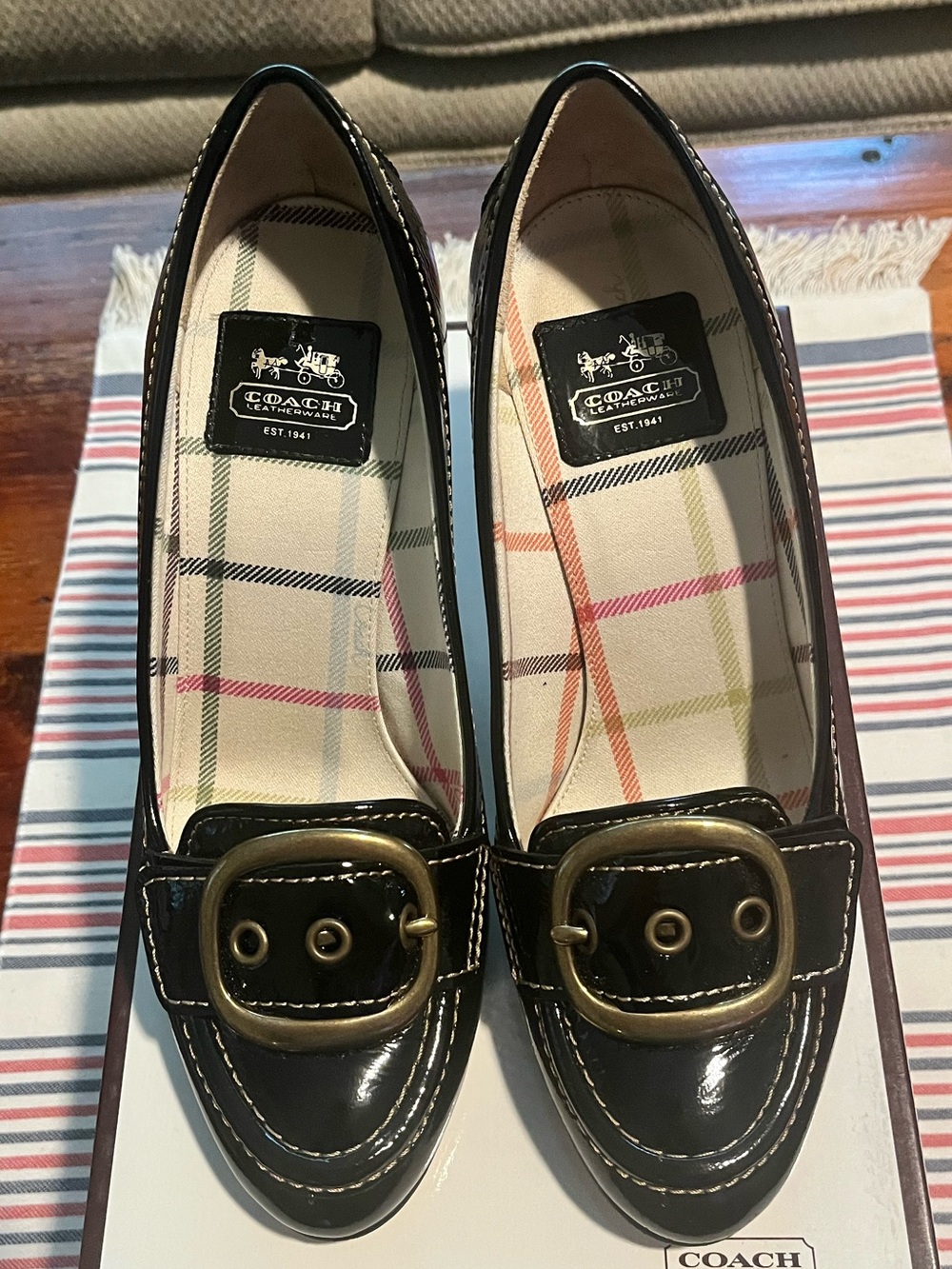 Coach Hillory Black Patent Leather with Antique Brass Buckle.